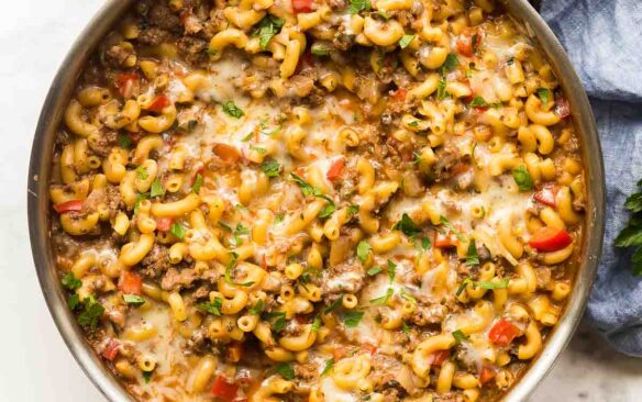 square image of homemade hamburger helper recipe in stainless steel skillet.