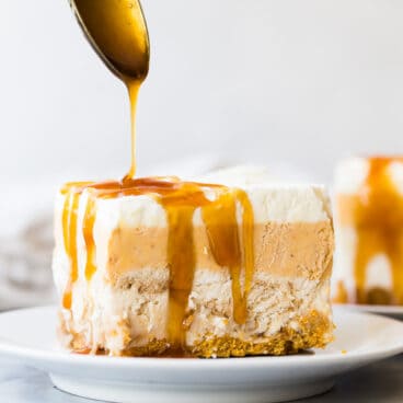 piece of frozen pumpkin dessert with a drizzle of butterscotch syrup