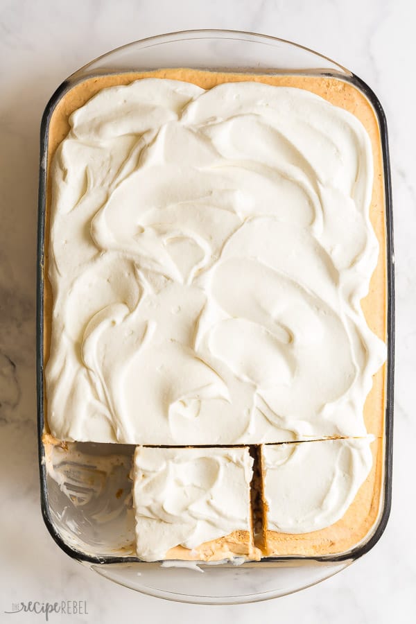 overhead image of frozen pumpkin dessert in 9 by 13 inch glass pan