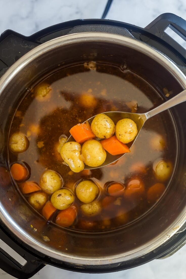 cook potatoes and carrots in gravy after taking out roast