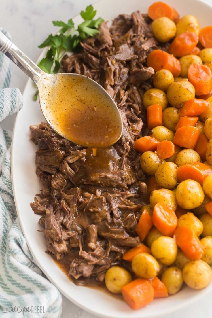 close up image of gravy being poured onto instant pot beef roast