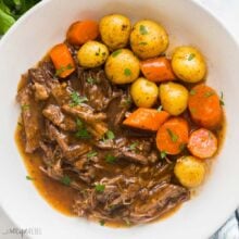 square image of instant pot pot roast with potatoes and carrots on the side