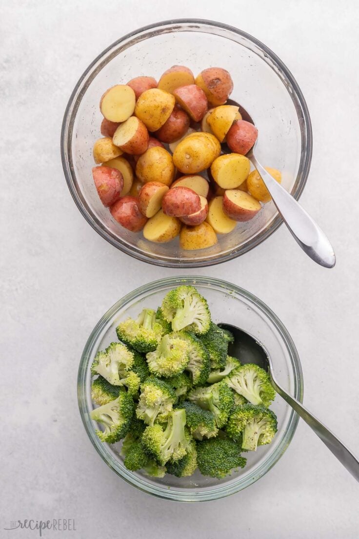 potatoes and broccoli each in a glass bowl.