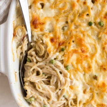 overhead image of spoon scooping turkey tetrazzini