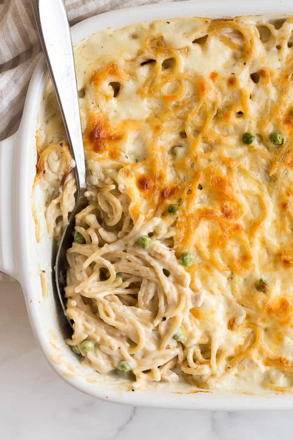 overhead image of spoon scooping turkey tetrazzini