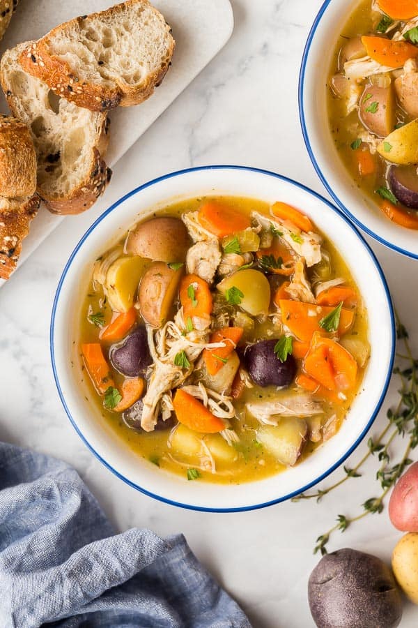 overhead image of chicken stew in white bowl