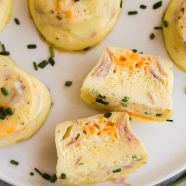 close up of instant pot egg bite cut open on white plate