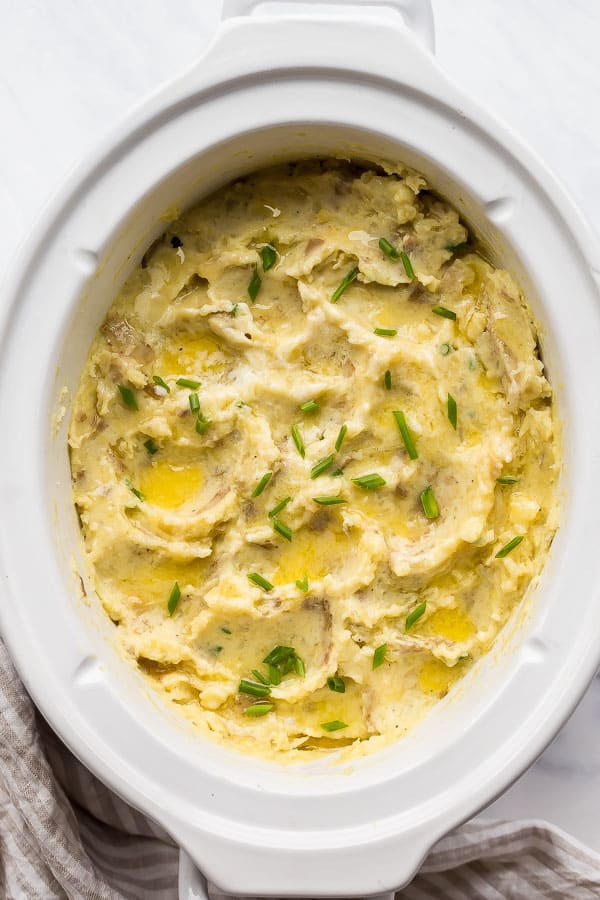 overhead image of slow cooker mashed potatoes in crockpot