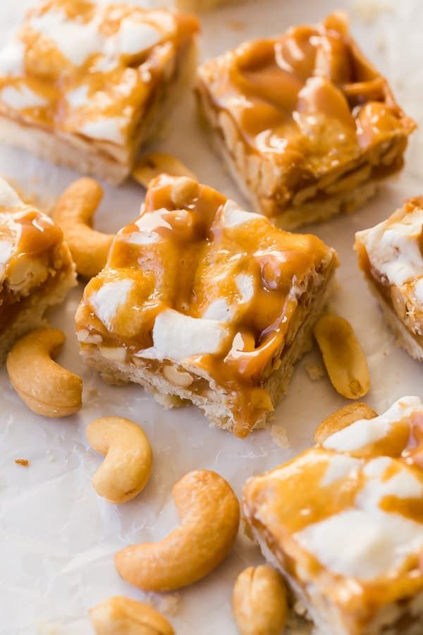 one square of caramel nut bars with cashews around it
