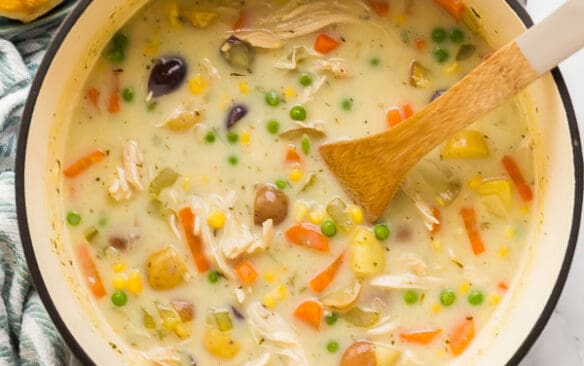 overhead image of chicken pot pie soup in dutch oven