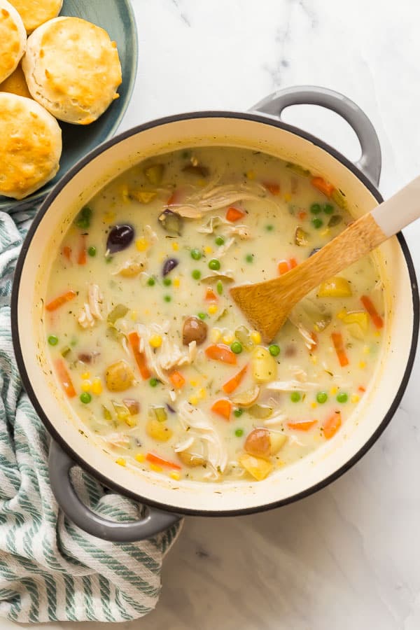 overhead image of chicken pot pie soup in dutch oven