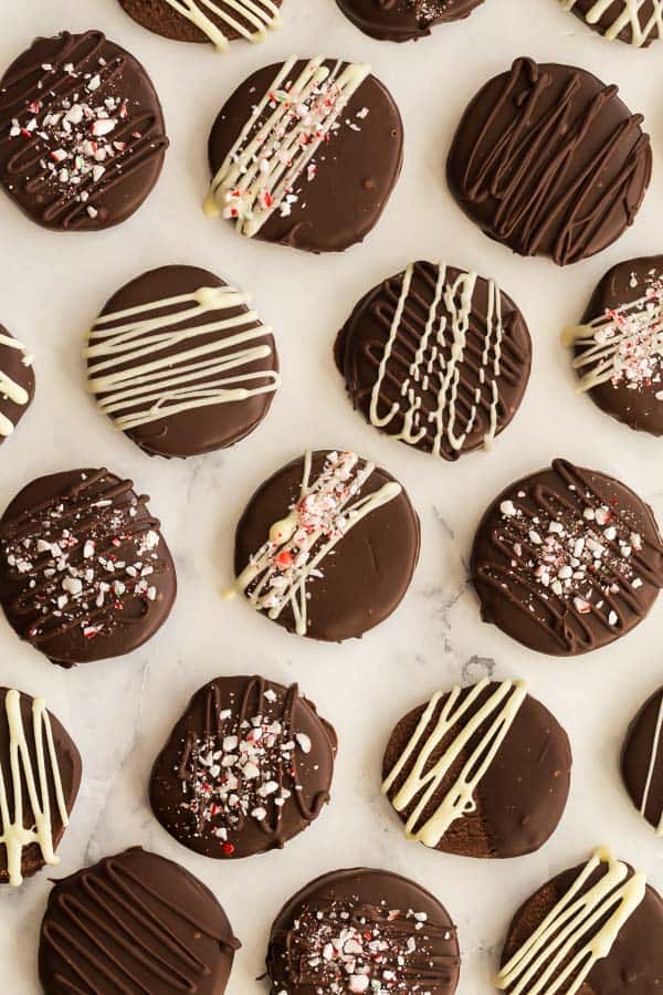 These Chocolate Icebox Cookies are dipped in dark or white chocolate, flavored with peppermint and sprinkled with crushed candy canes -- the prettiest Christmas cookie! #chocolate #cookie #christmas #baking overhead image of chocolate icebox cookies