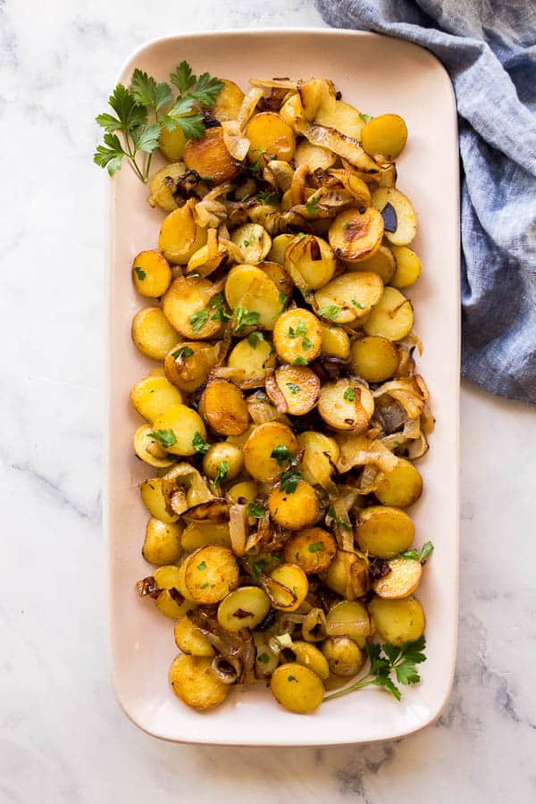 overhead image of rectangular platter full of potatoes