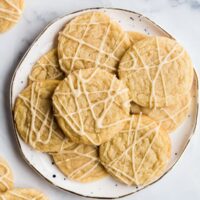 overhead image of maple cookies on white plate