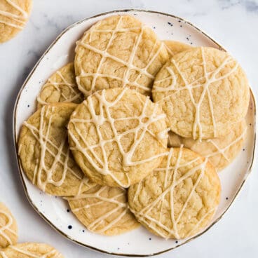 overhead image of maple cookies on white plate