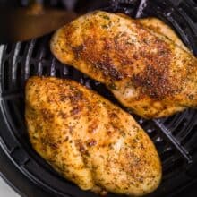 air fryer chicken breast in basket of air fryer