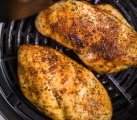 air fryer chicken breast in basket of air fryer