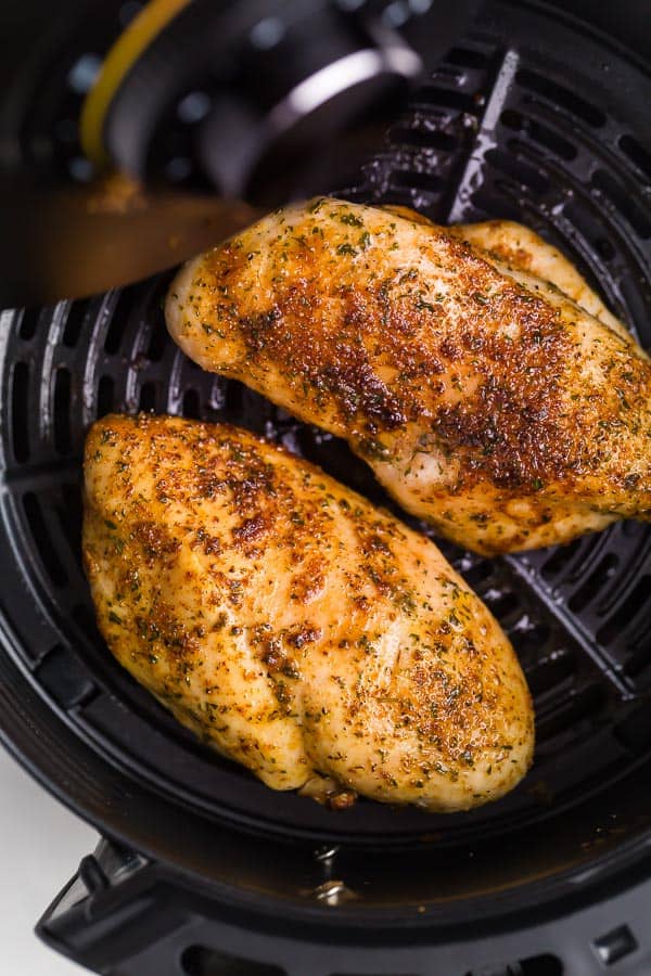 air fryer chicken breast in basket of air fryer