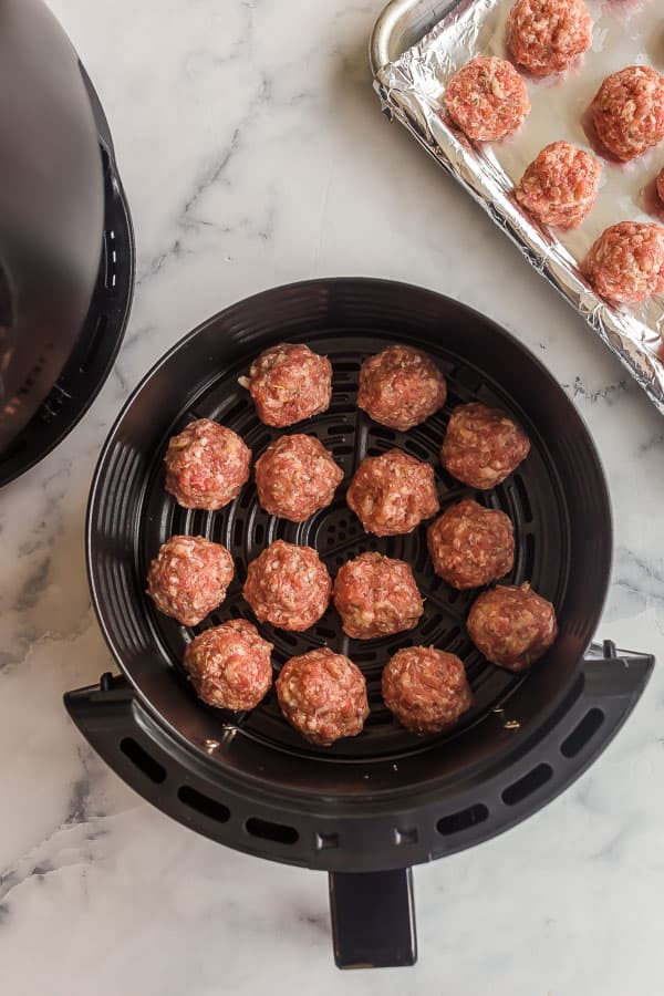 raw meatballs in air fryer basket