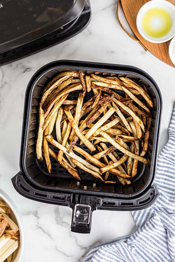 overhead image of french fries in air fryer