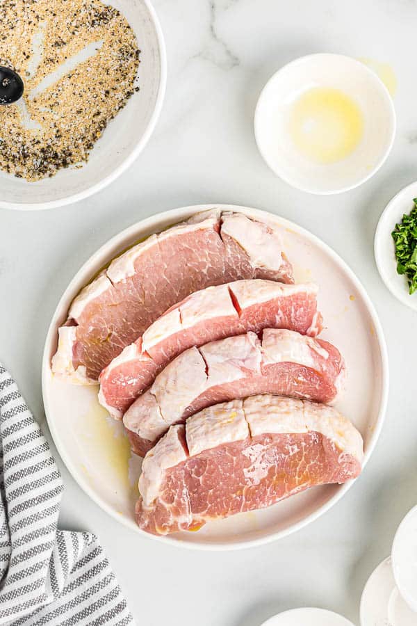 boneless pork chops with slits cut in fat cap