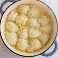 overhead image of pot with dumplings puffed after the lid was removed