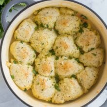 overhead image of large pot with soup and bisquick dumplings