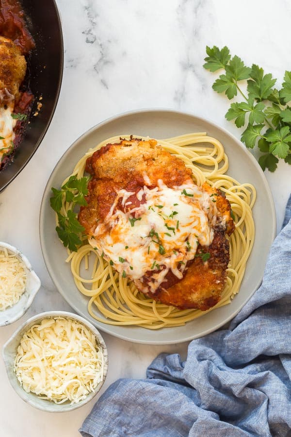 chicken parmesan on plate with spaghetti