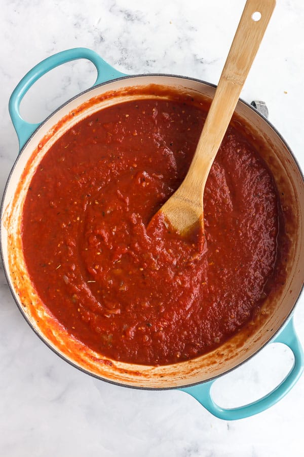 overhead image of tomato sauce in large pan