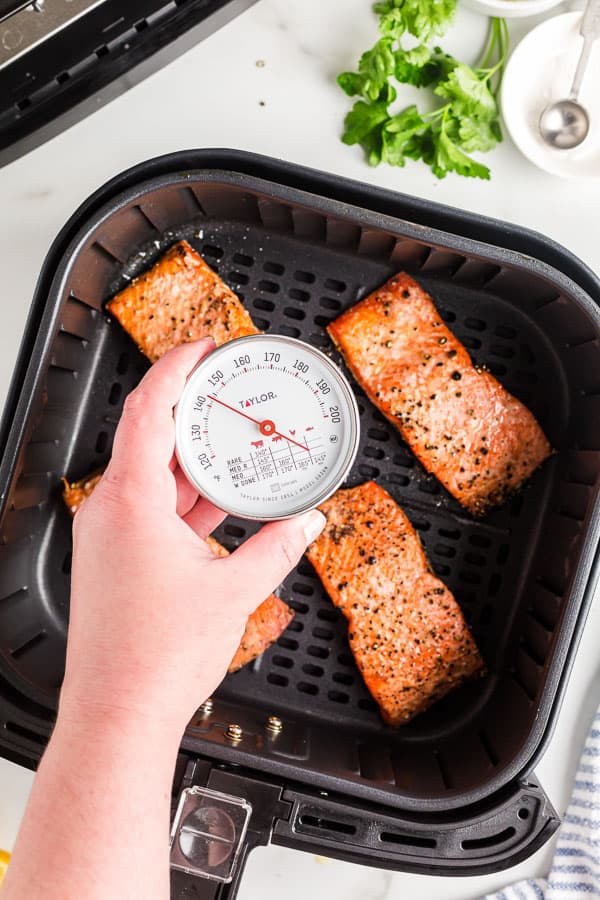 air fryer salmon with 145 degrees on thermometer