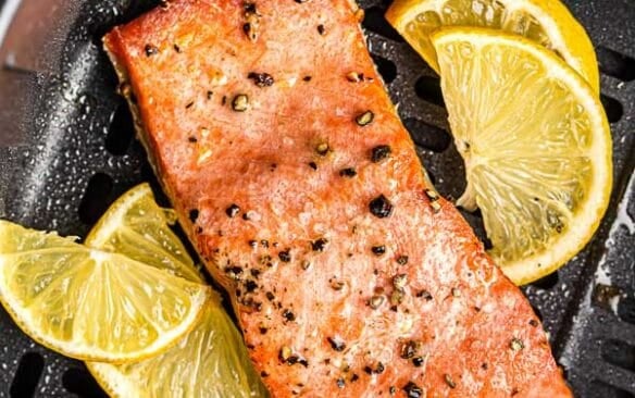 close up image of cooked salmon in air fryer