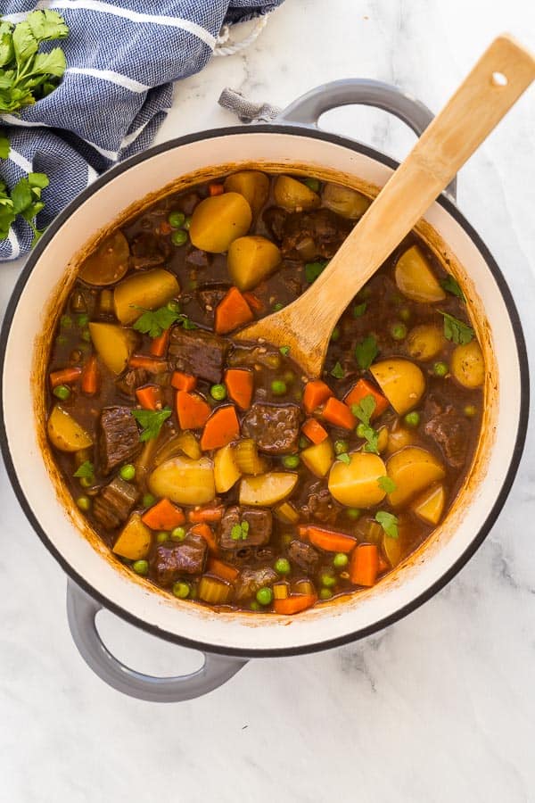 overhead image of beef stew in dutch oven