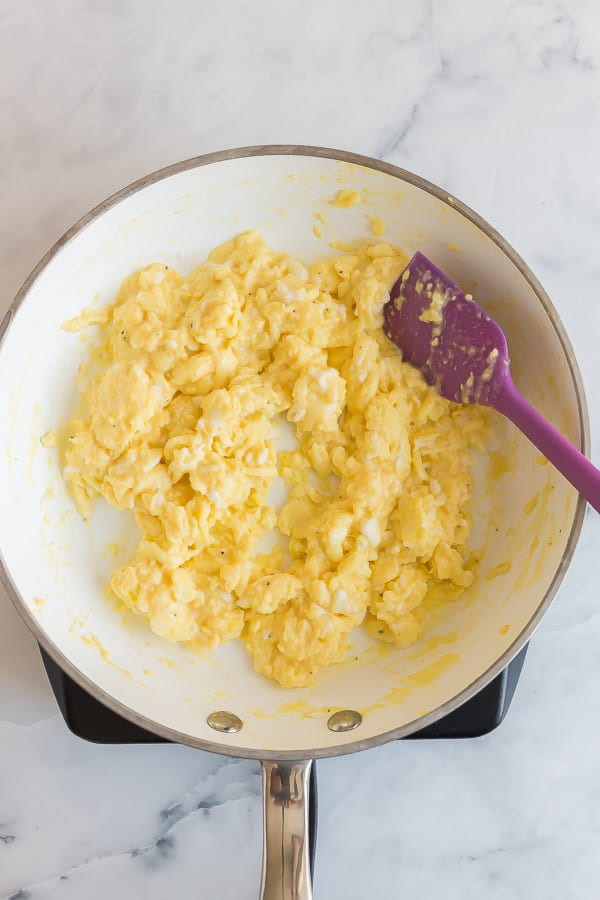 scrambled eggs in white pan
