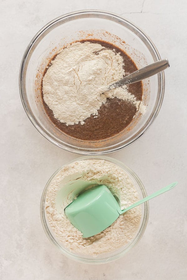 two bowls one with flour one with dough mixture