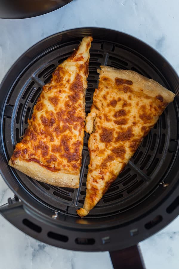 leftover pizza slices in air fryer basket