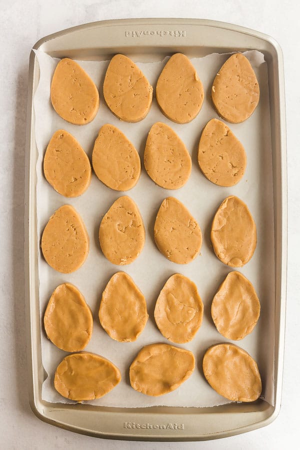 plain peanut butter eggs on sheet pan