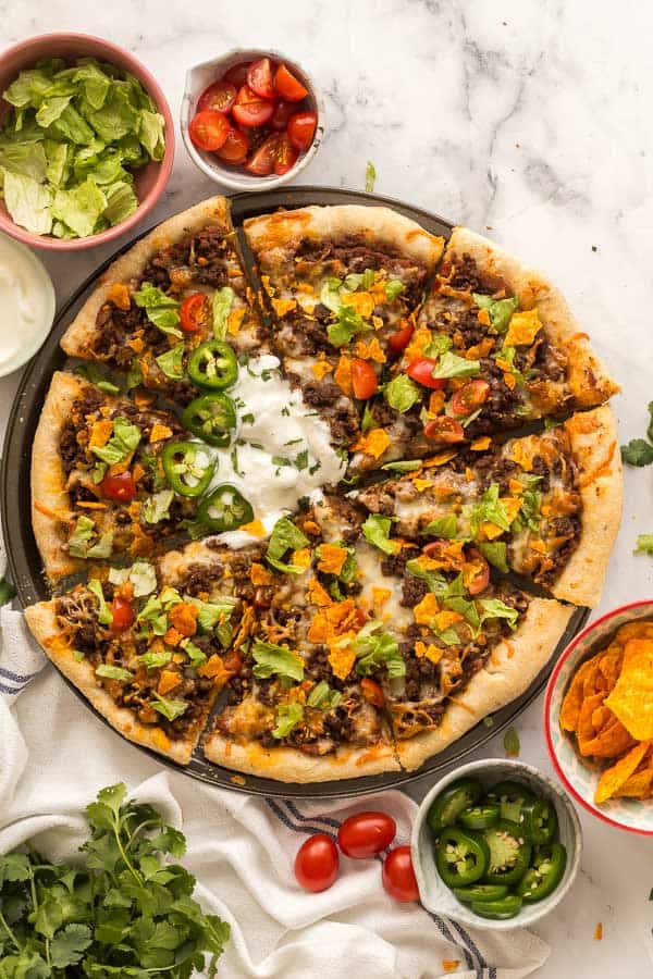 overhead image of taco pizza sliced