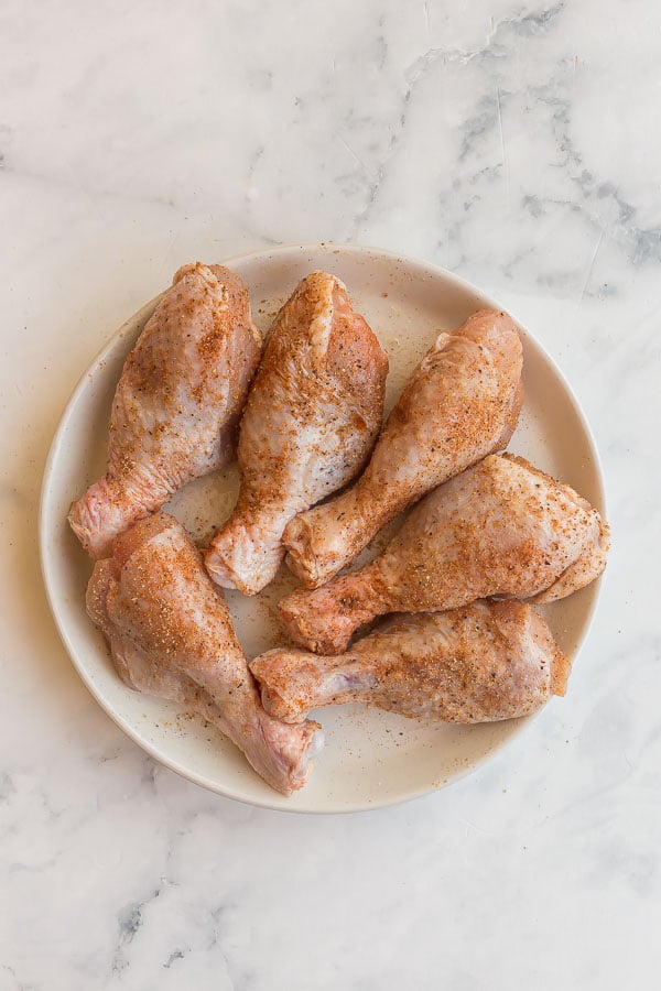 seasoned chicken drumsticks ready for air fryer