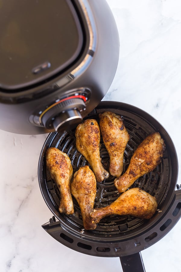 cooked chicken legs in air fryer basket