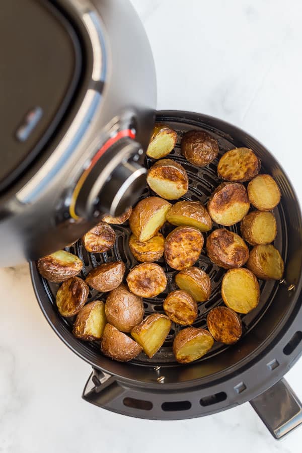 cooked potatoes in air fryer basket