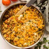 overhead image of taco mac in skillet with wooden spoon