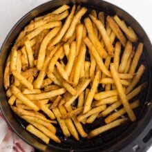 overhead image of french fries in air fryer