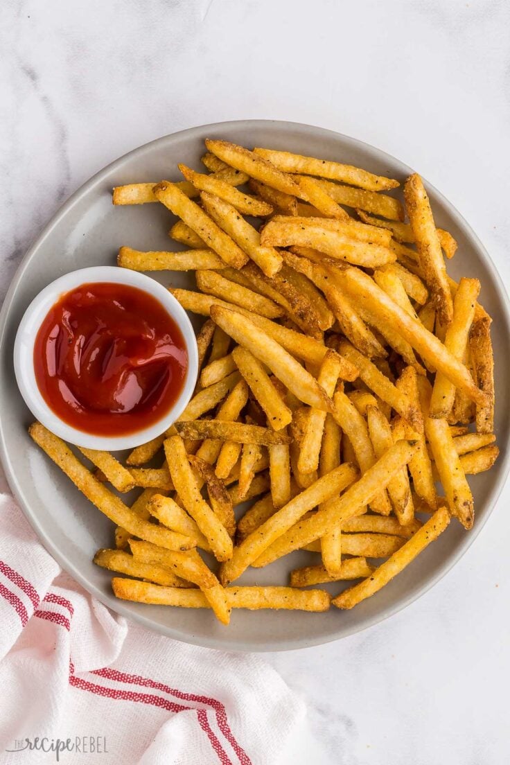 crispy air fryer french fries on grey plate