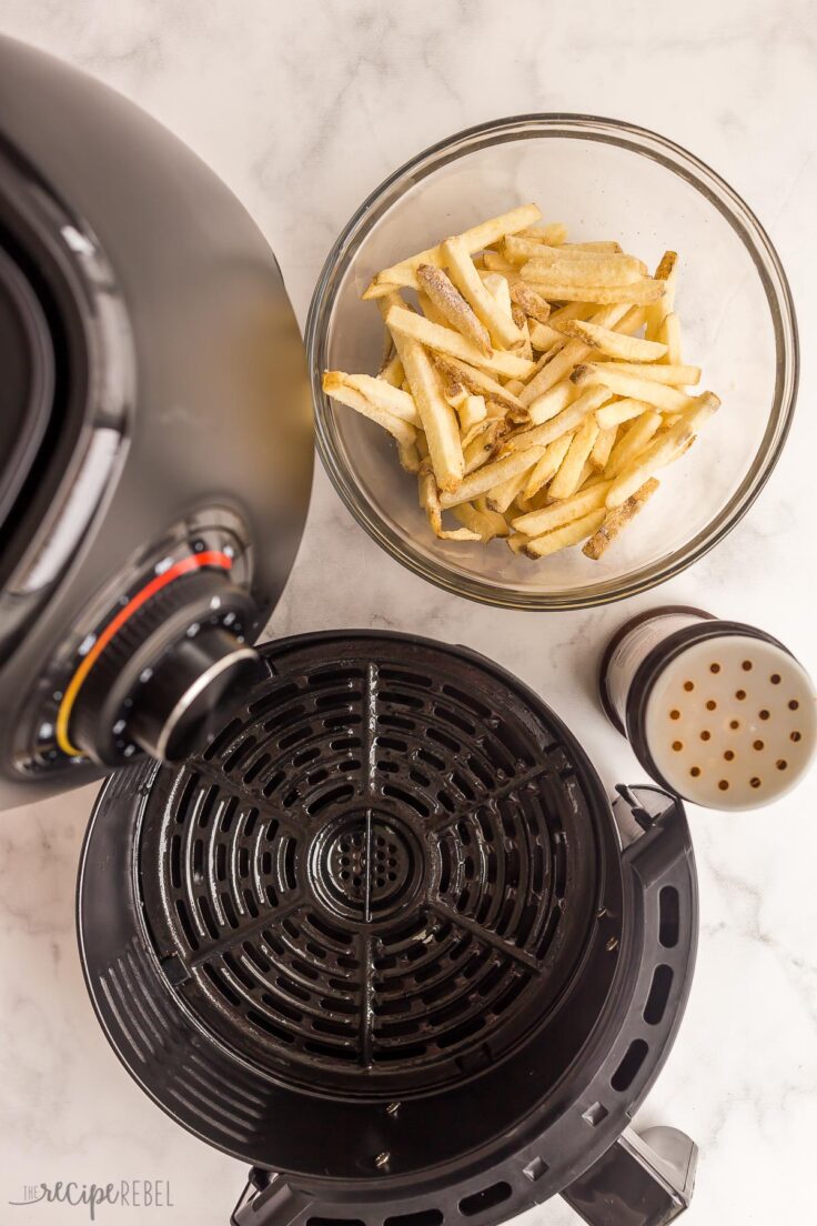 frozen french fries in bowl ready to go in air fryer