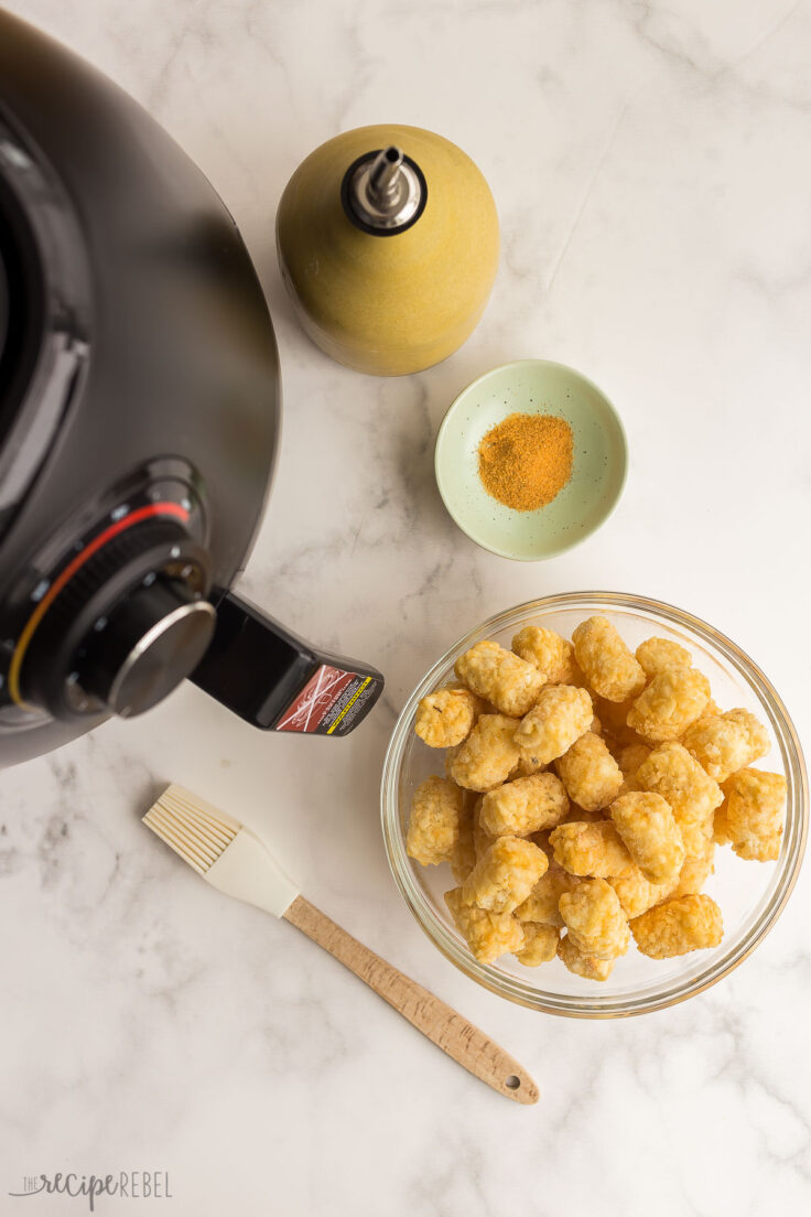 frozen tater tots with oil and seasoning salt