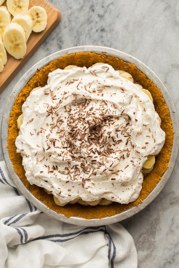 overhead image of banoffee pie on marble background