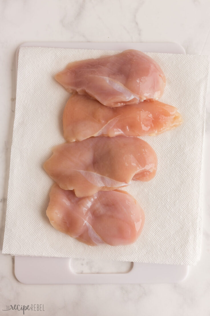 chicken breasts drying on paper towels