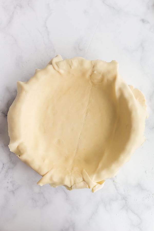 unbaked pie crust in pie plate