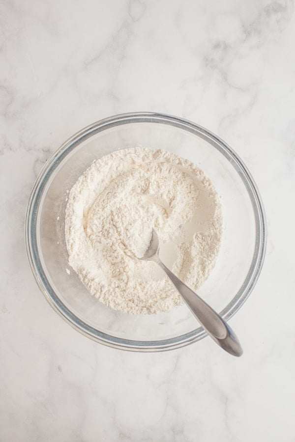 overhead image of dry pie crust ingredients in bowl