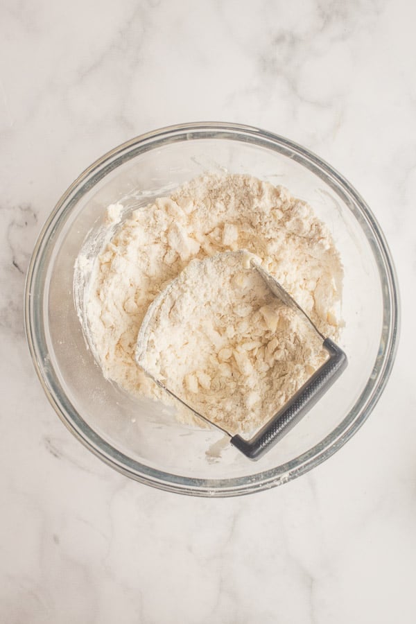 cold butter crumbled into dry ingredients for pie crust